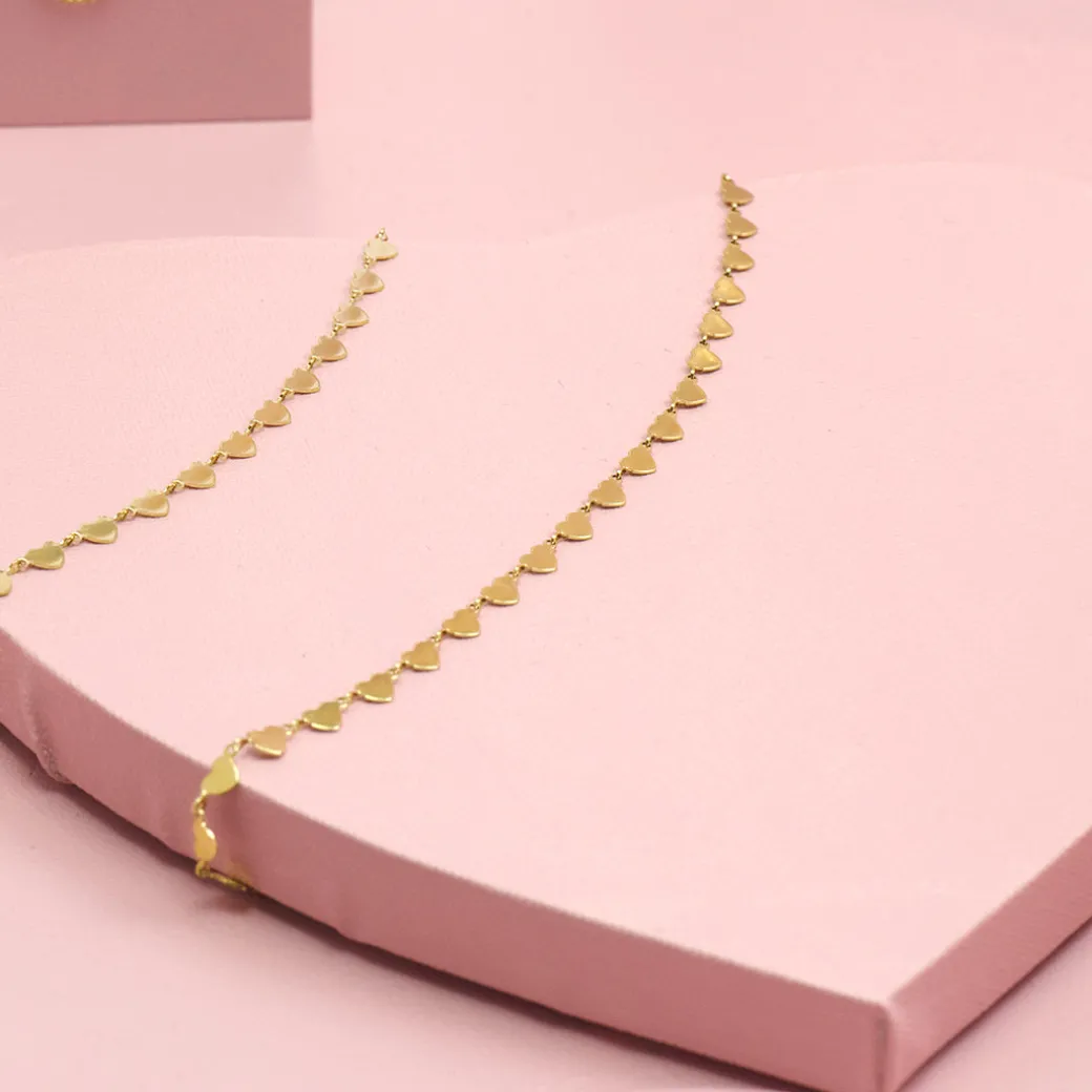 Goudkleurige armband + ketting set met hartjes