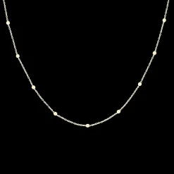 Goudkleurige armband + ketting set met bolletjes