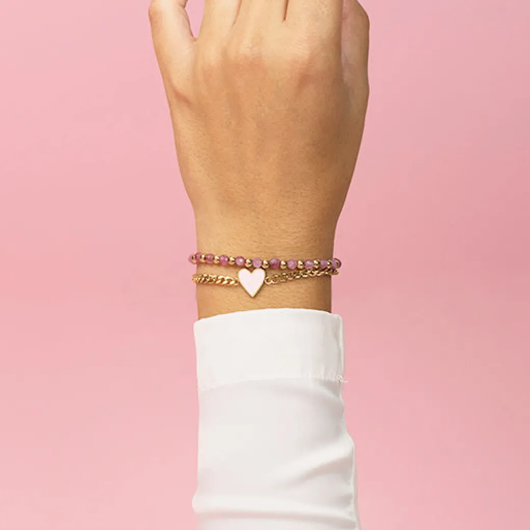 Goudkleurige armband met roze hart bedeltje