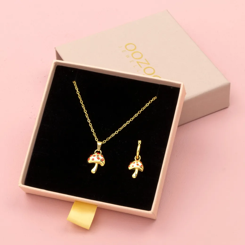 Goudkleurige oorring + ketting set met een paddenstoel bedeltje