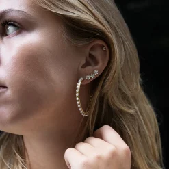 Goudkleurige oorringen met parels