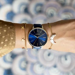 Goudkleurige OOZOO horloge met donker blauwe leren band - C11292