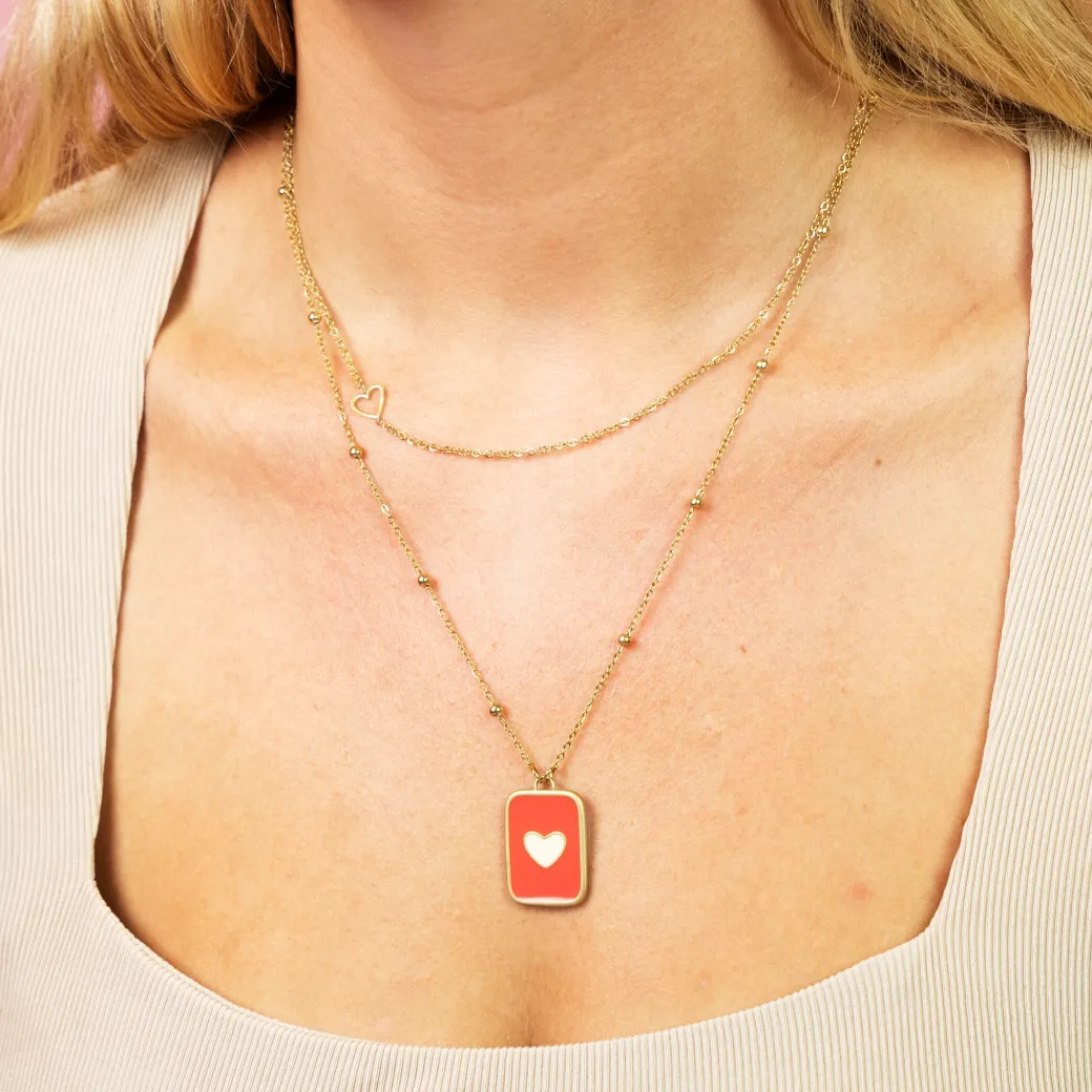 Goudkleurig/rode ketting met een hart plaatje