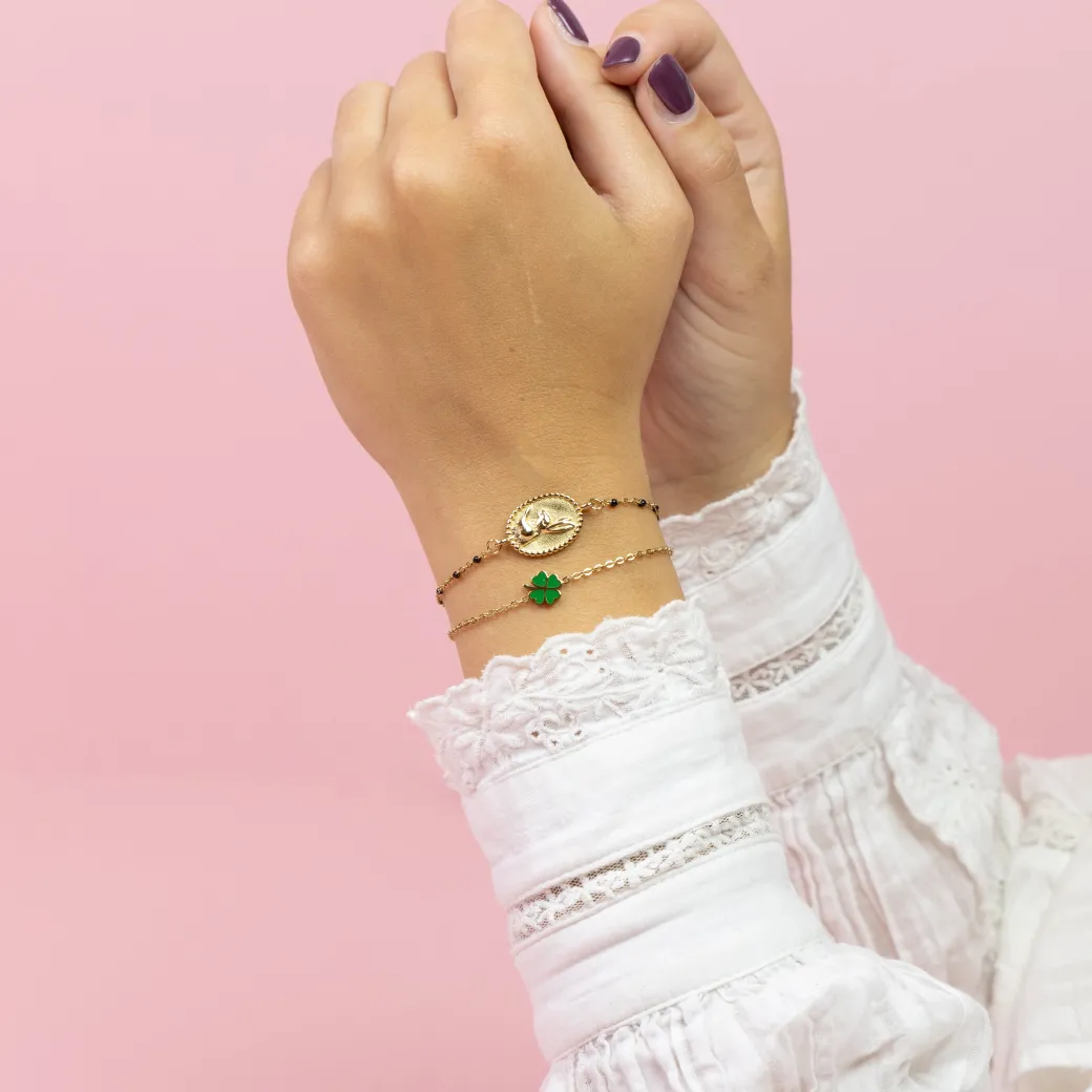 Goudkleurig/zwarte armband met een haas