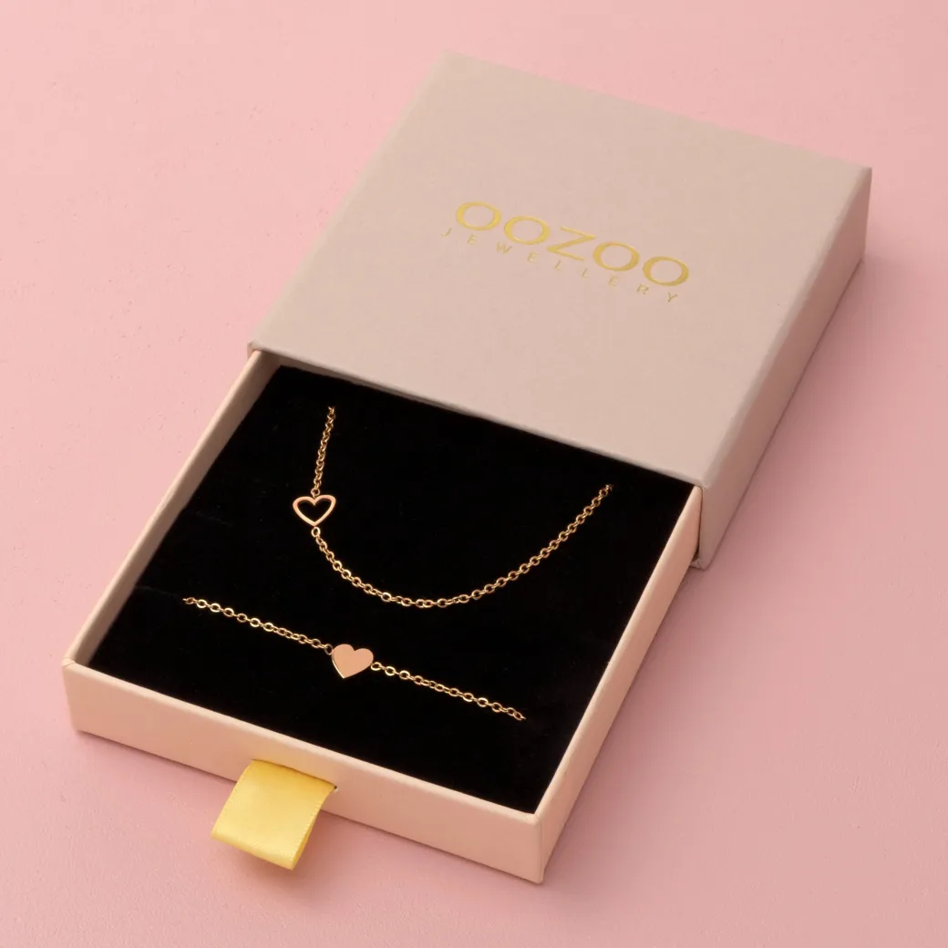 Rosé goud kleurige armband + ketting set met een hart
