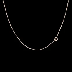 Rosé goud kleurige armband + oorbellen + ketting set met een klaver