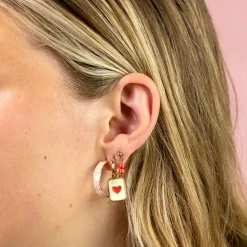 Rosé goudkleurige oorringen met roze plating