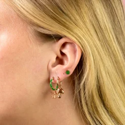 Rosé goudkleurig/groene oorbellen met een groene klaver
