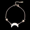 Rosé goudkleurig/witte armband met een maan bedeltje