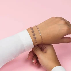 Rosé kleurige armband met smileys