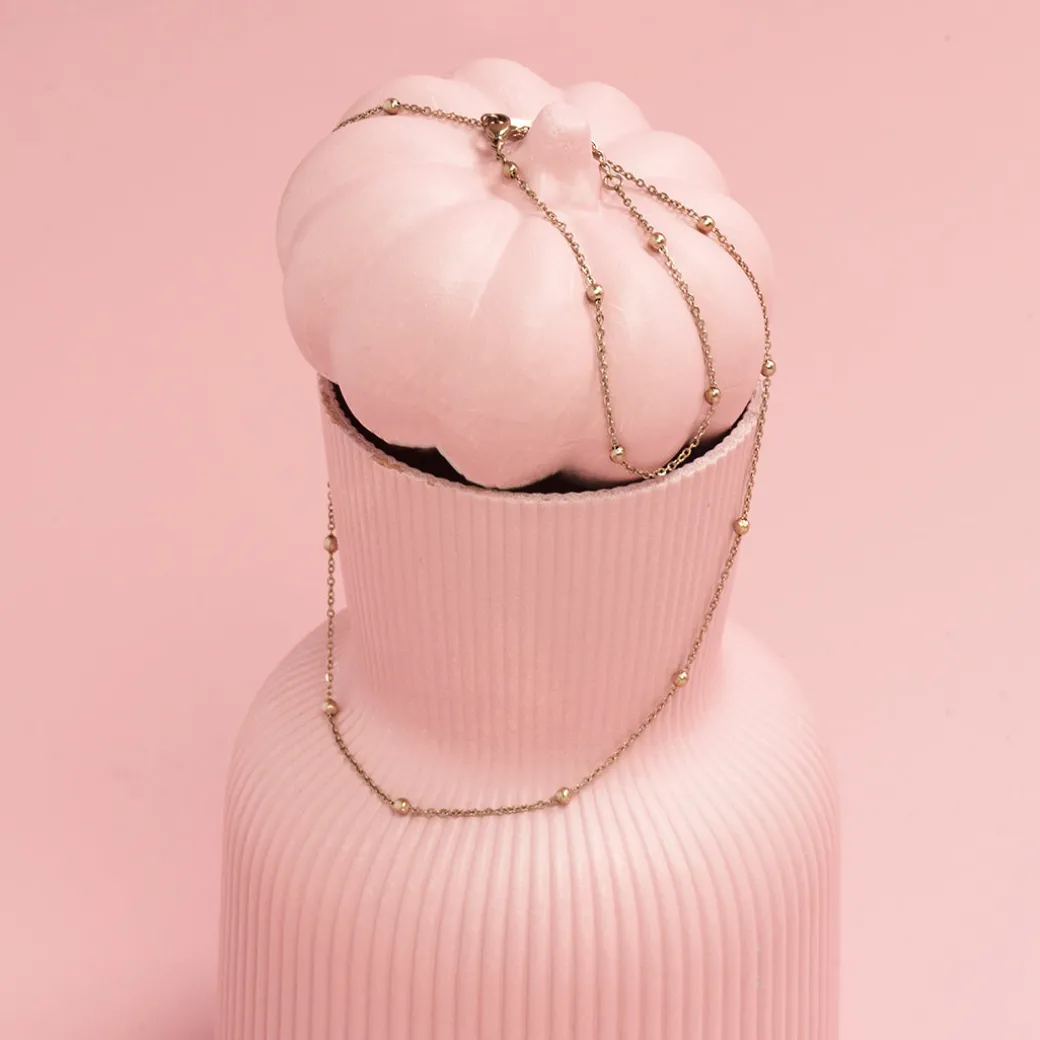 Rosé kleurige armband met bolletjes