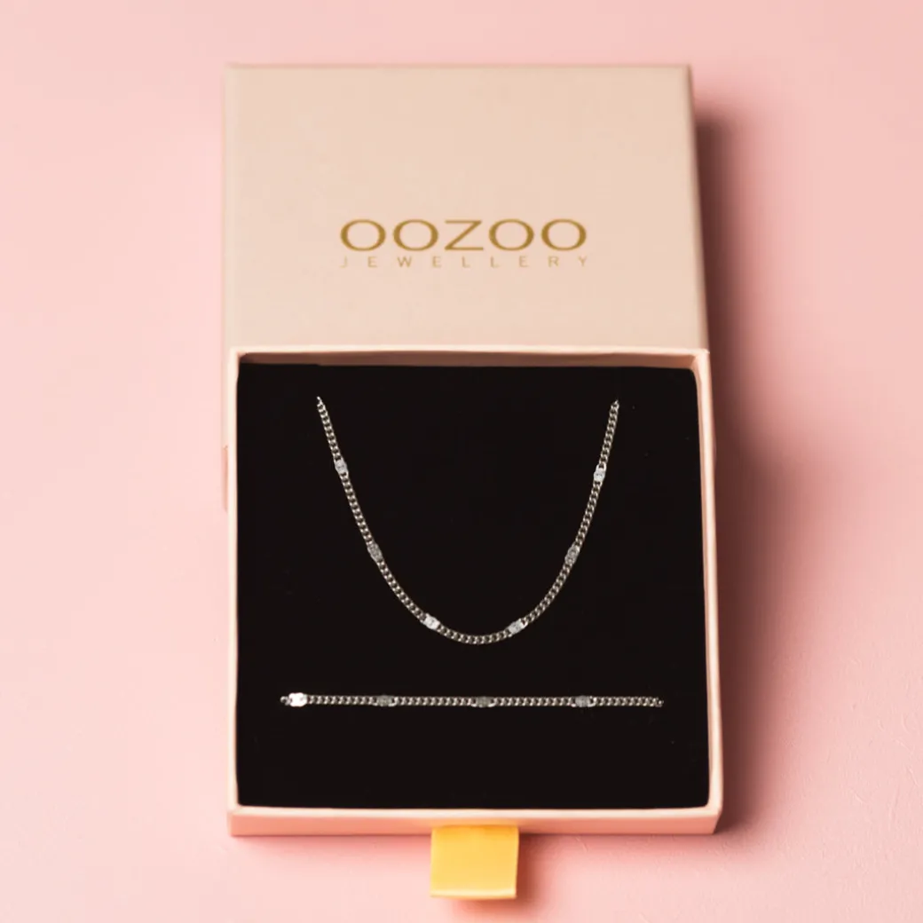 Zilverkleurige armband + ketting set met klassiek detail