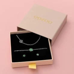 Zilverkleurige armband + oorbellen + ketting set met een klaver