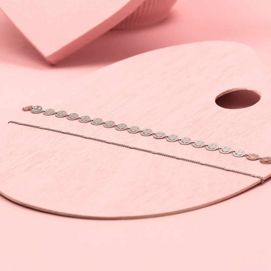 Zilverkleurige armband met smileys